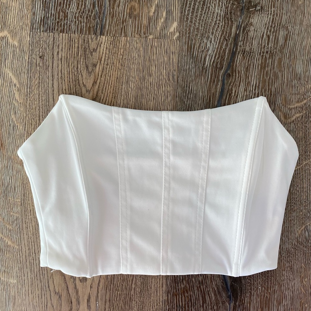 A cute white crop top for going out.